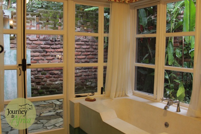 The bathroom with 3 options on how to clean after a Safari. Indoor shower, outdoor shower or tub. Choices!